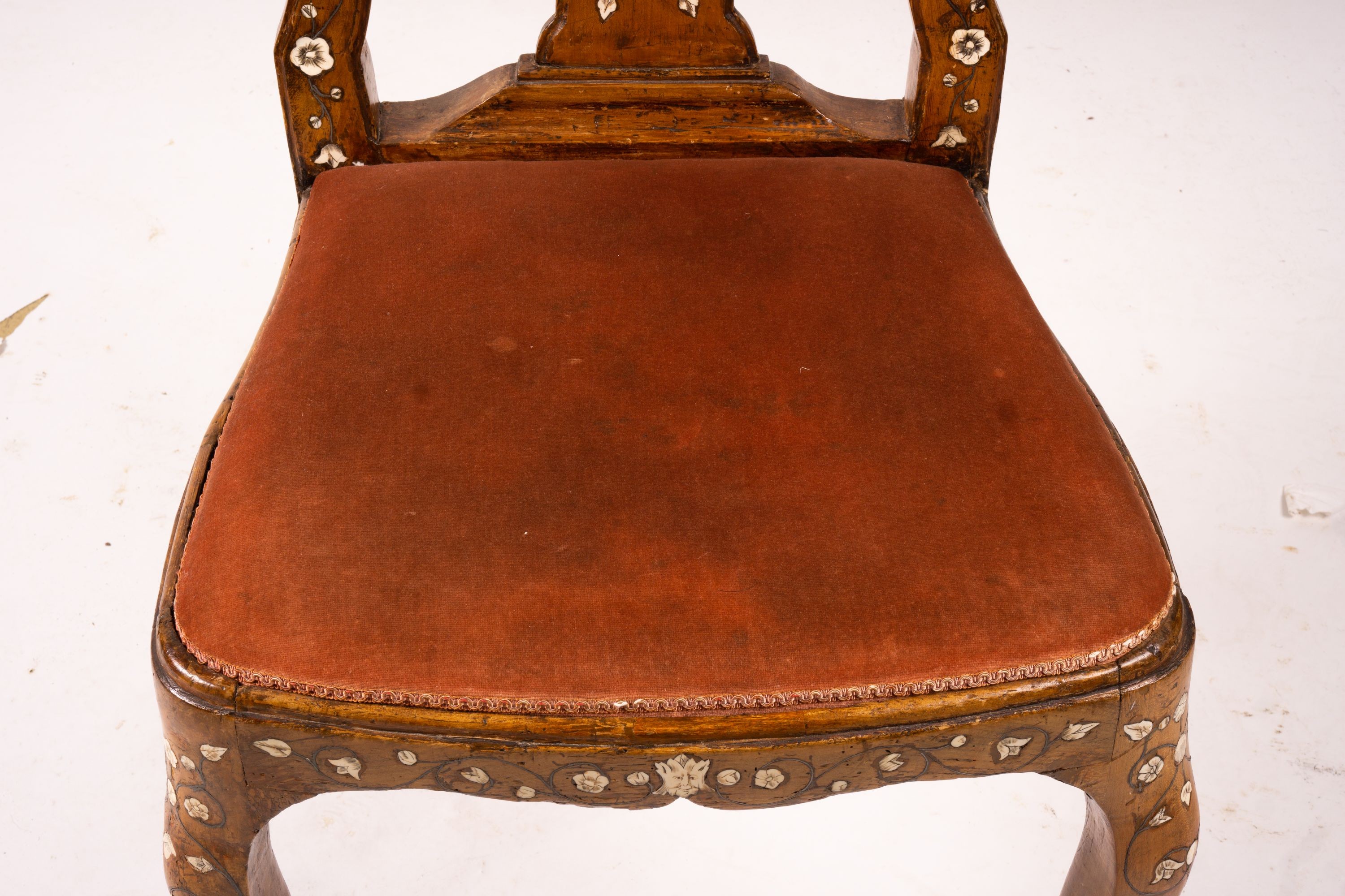 An 18th century ivory inlaid side chair